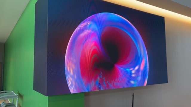 Installed LED video wall displaying colorful abstract artwork